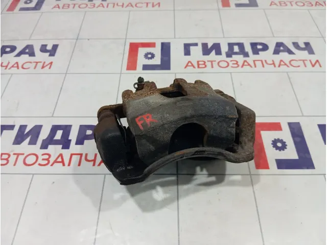 Суппорт тормозной передний правый Kia Rio 581304L000