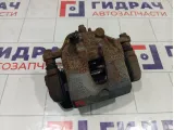 Суппорт тормозной передний правый Kia Rio 581304L000