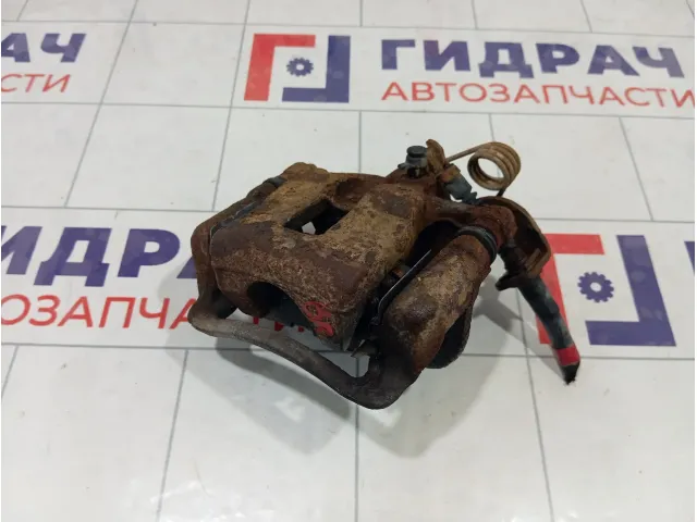 Суппорт тормозной задний правый Kia Rio 584001R300