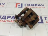 Суппорт тормозной задний правый Kia Rio 584001R300