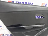 Обшивка двери задней левой Kia Rio 833014Y030WK