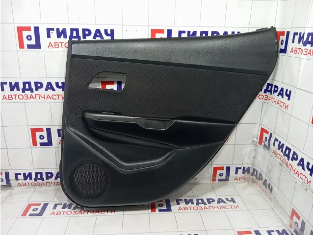 Обшивка двери задней правой Kia Rio 833024Y030WK