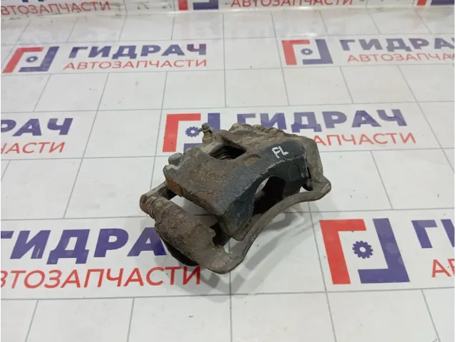 Суппорт тормозной передний левый Kia Rio 581104L000