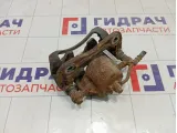 Суппорт тормозной передний левый Kia Rio 581104L000