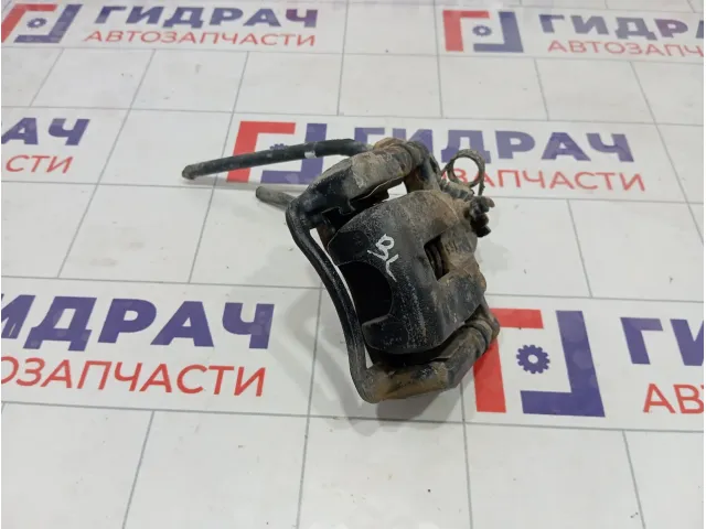 Суппорт тормозной задний левый Kia Rio 583001R300