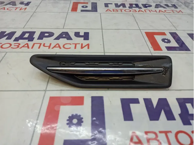 Накладка крыла переднего левого Kia Rio 877714Y000