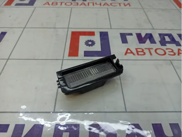 Фонарь подсветки номера левый Kia Rio 92501F6000