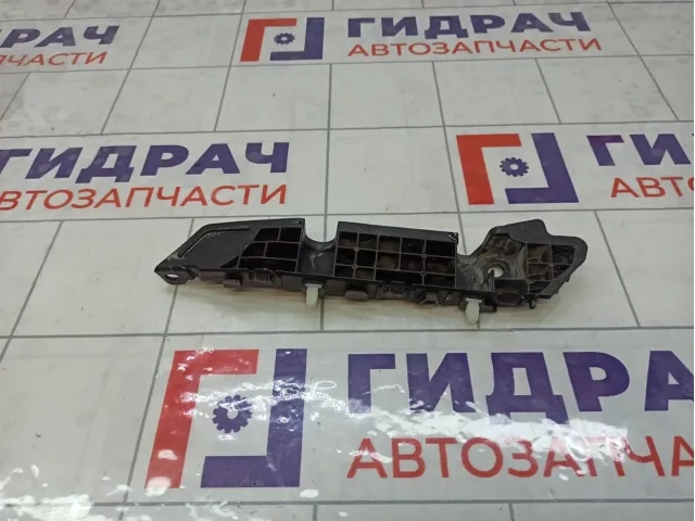 Кронштейн бампера переднего левый Kia Rio 86515H0000