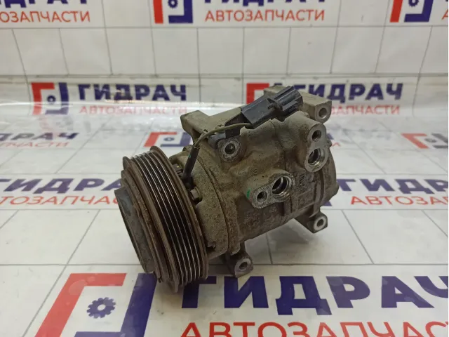 Компрессор системы кондиционирования Kia Rio 977011S400