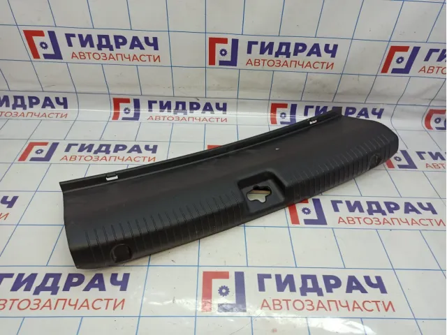 Обшивка багажника на заднюю панель Kia Rio 3 (QB) 857704Y000WK