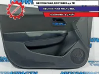 Обшивка двери передней левой Kia Rio 3 823014Y390WK. Есть потертости, царапины.