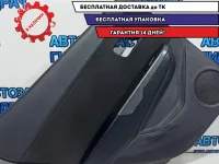 Обшивка двери задней левой Kia Rio 3 833014Y100WK. Потертость.