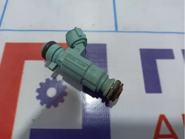 Форсунка инжекторная электрическая Kia Rio 3 (QB) 35310-26600