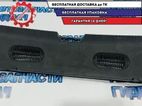 Обшивка багажника на заднюю панель Kia Rio 3 857704Y500WK. Царапины.
