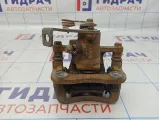 Суппорт тормозной задний правый Kia Rio 3 58400-1R300.