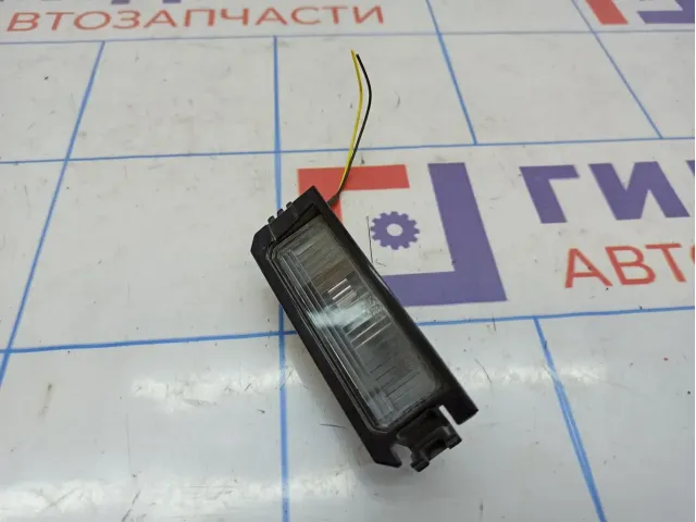 Фонарь подсветки номера левый Kia Rio 4 рестайлинг 92501-F6000.