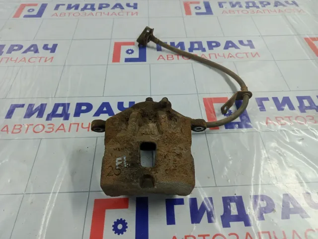 Суппорт тормозной передний левый Kia Soul 581102K100