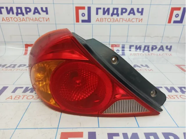 Фонарь задний левый Kia Spectra (SD) 0K2NC51160A