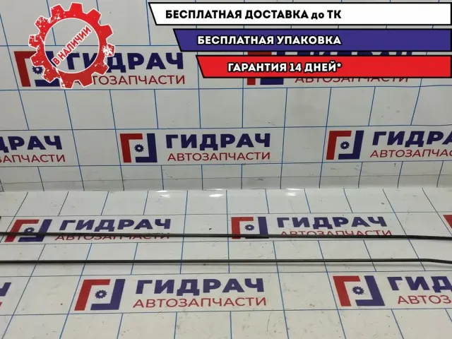 Торсион багажника Kia Spectra . Комплект.