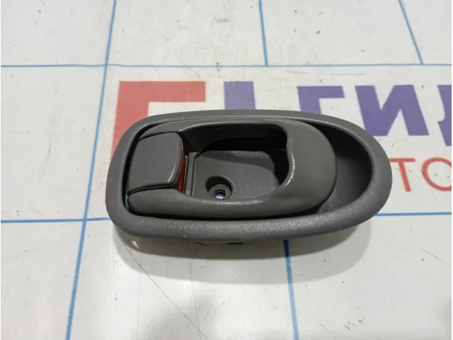 Ручка двери внутренняя левая Kia Spectra (SD) 0K2N15933096