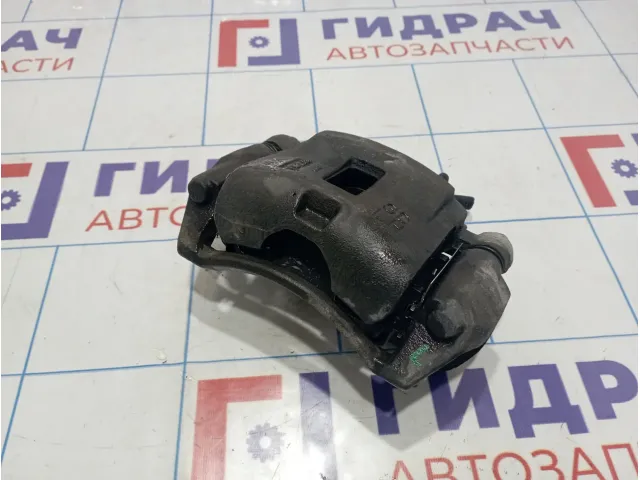 Суппорт тормозной передний левый Kia Spectra (SD) K0BB1-49990