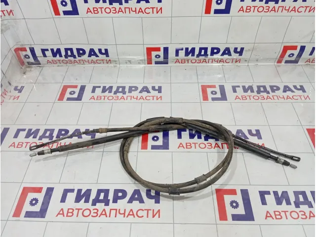 Трос ручника (Трос стояночного тормоза) Lada Granta
