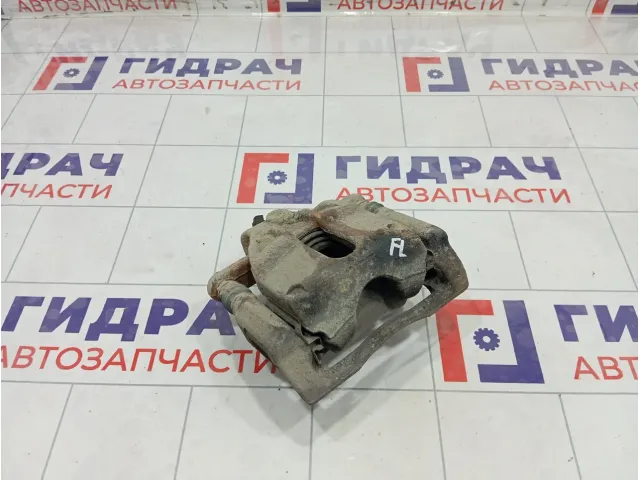 Суппорт тормозной передний левый Lada Largus 7701208332