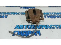 Суппорт тормозной передний левый Lada Largus 7701208332.