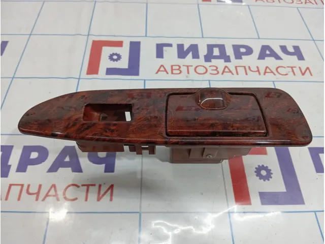 Накладка кнопки стеклоподъемника задняя левая Toyota Land Cruiser 100 74204-60060-A0