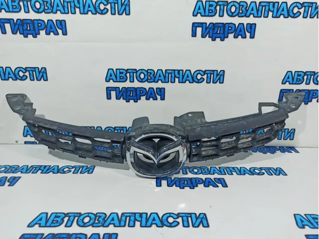 Решетка радиатора Mazda CX-7 EG21-50-710D.