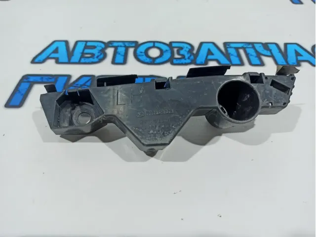 Направляющая переднего бампера левая Mazda CX-7 EH14-50-0U1.