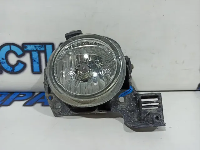 Фара противотуманная левая с кронштейном Mazda CX-7 L169-51-690A. Дефект.