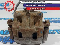 Суппорт тормозной передний левый Mazda CX-7 L206-33-990A.