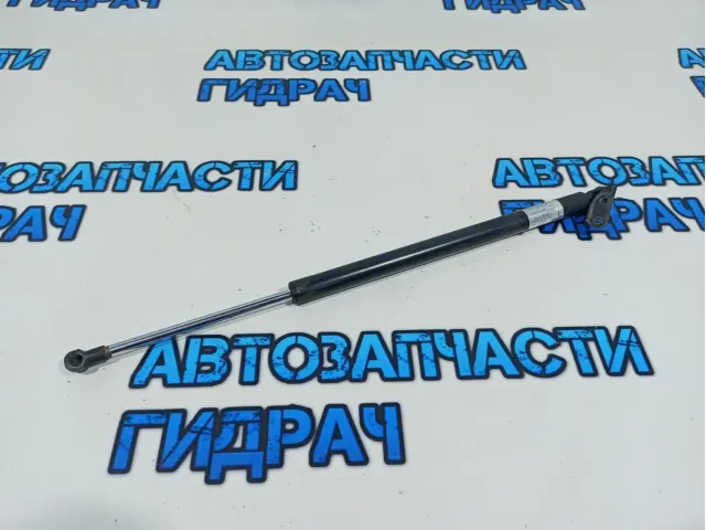 Амортизатор двери багажника левый Mazda CX-7 EG21-63-620D.