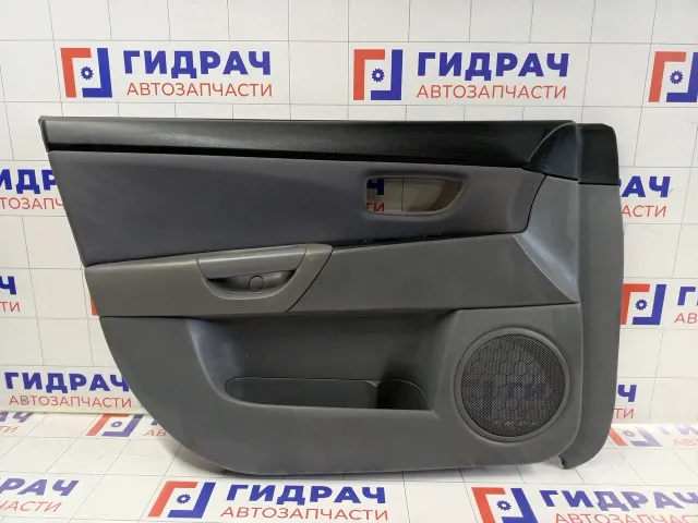 Обшивка двери передней левой Mazda 3 BS4H68450C