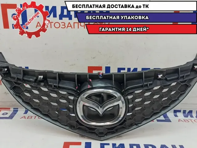 Решетка радиатора Mazda Mazda3 (BK) BR5H-50-710C. Дефекты.