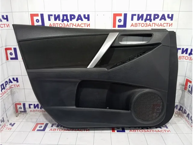 Обшивка двери передней левой Mazda 3 BHC268460A02