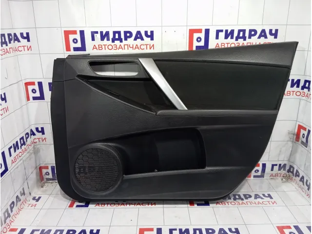 Обшивка двери передней правой Mazda 3 BHC268430A02