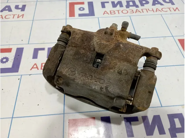 Суппорт тормозной передний левый Mazda Mazda 3 (BM) B4Y0-33-99ZB