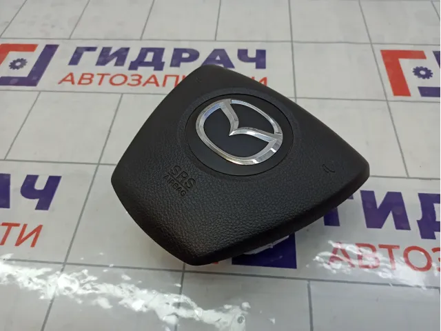 Подушка безопасности в рулевое колесо Mazda 6 GS1G57K00