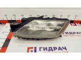 Фара левая Mazda CX-7 EH10-51-041B. Дефекты отражателя и стекла.