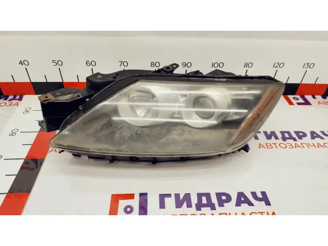 Фара левая Mazda CX-7 EH10-51-041B. Дефекты отражателя и стекла.
