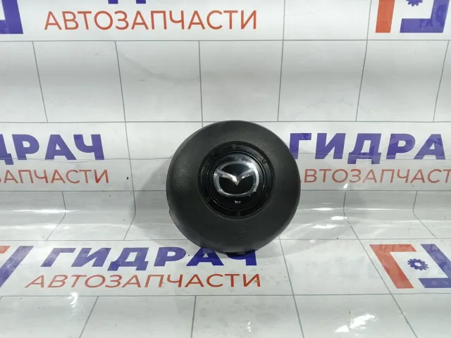 Подушка безопасности в рулевое колесо Mazda CX-7 E22357K00A