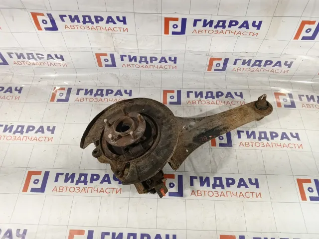 Кулак поворотный задний левый Mazda CX-7 EG2528250B