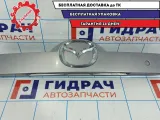 Накладка двери багажника Mazda CX-7 EG24-50-810E-06. Дефект хрома.