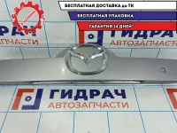 Накладка двери багажника Mazda CX-7 EG24-50-810E-06. Дефект хрома.