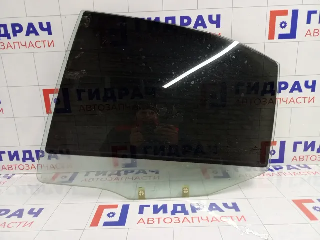 Стекло двери задней левой Mitsubishi Carisma