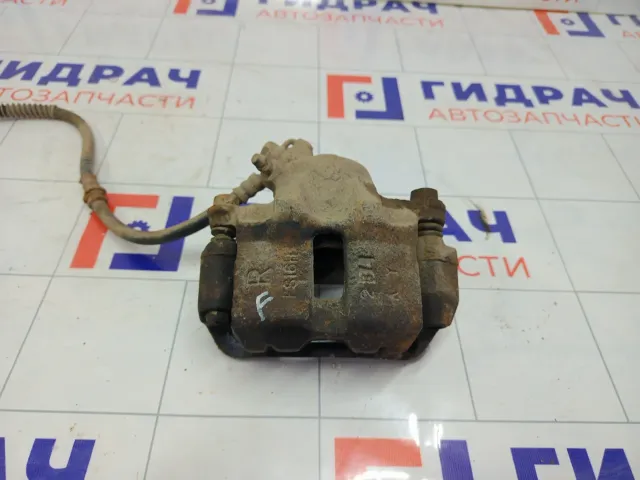 Суппорт тормозной передний правый Mitsubishi Colt MB928425