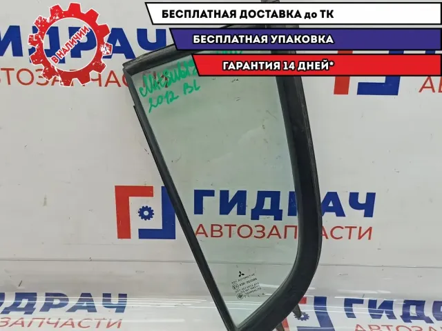 Стекло двери задней левой (форточка) Mitsubishi L200 5740A205.