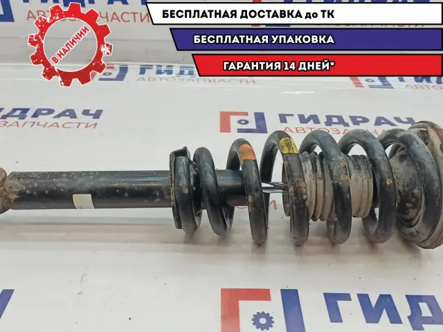 Амортизатор передний Mitsubishi L200 4062A031. В сборе.